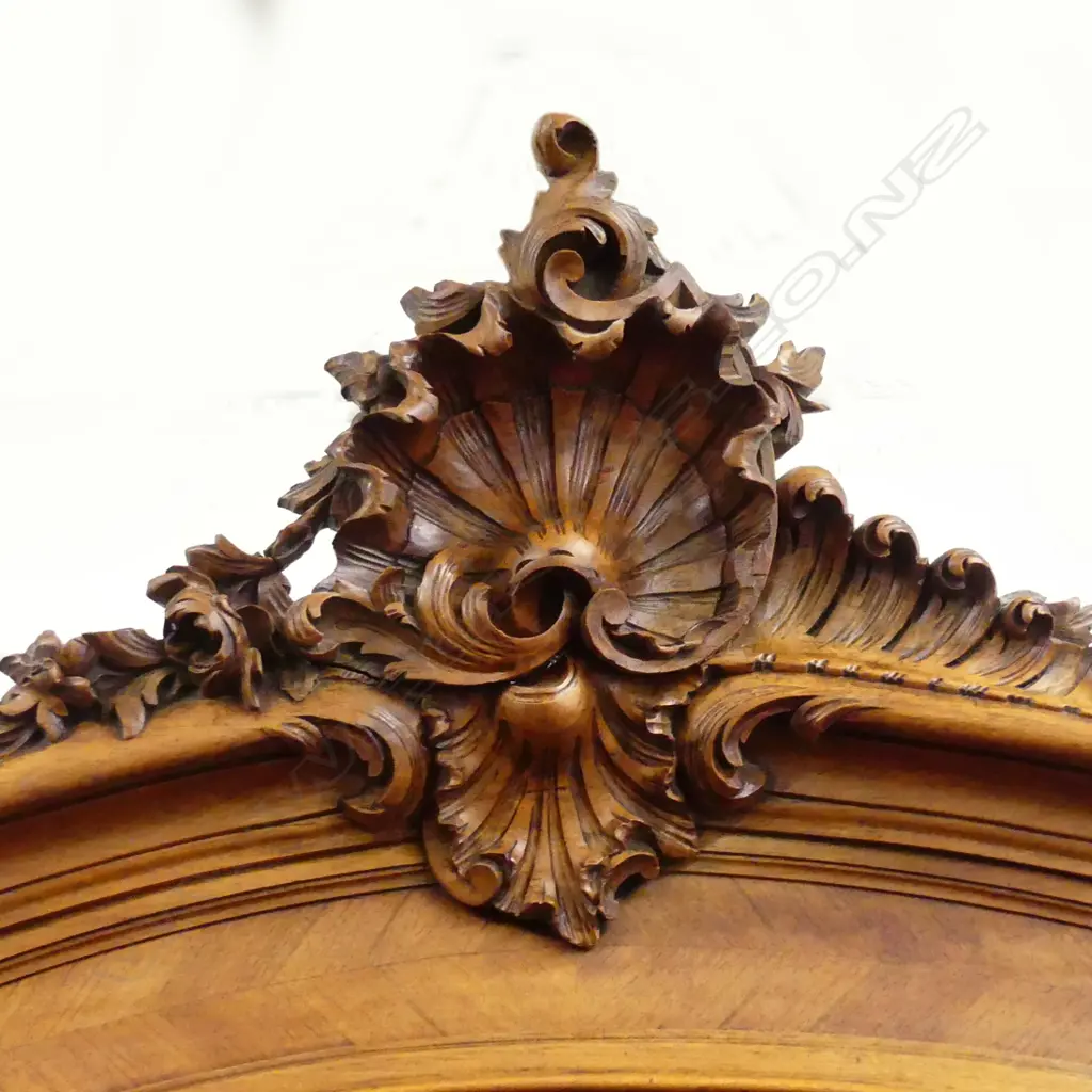 A 19thC French walnut armoire with ornate carved pediment Image 1++