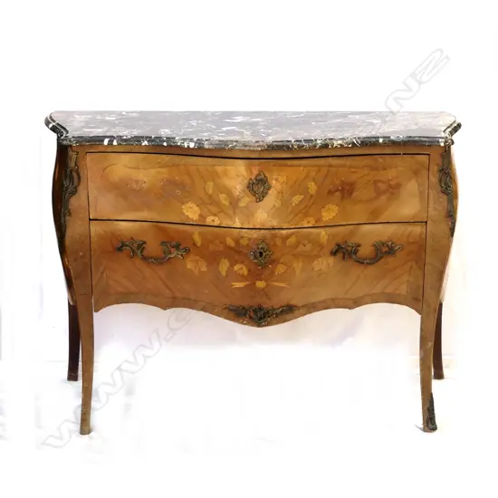 A marble top French style bombe commode