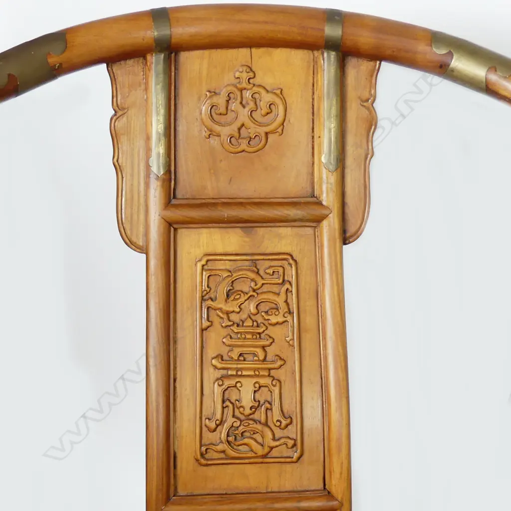 A pair of Chinese hardwood horseshoe-back folding armchairs Image 1++