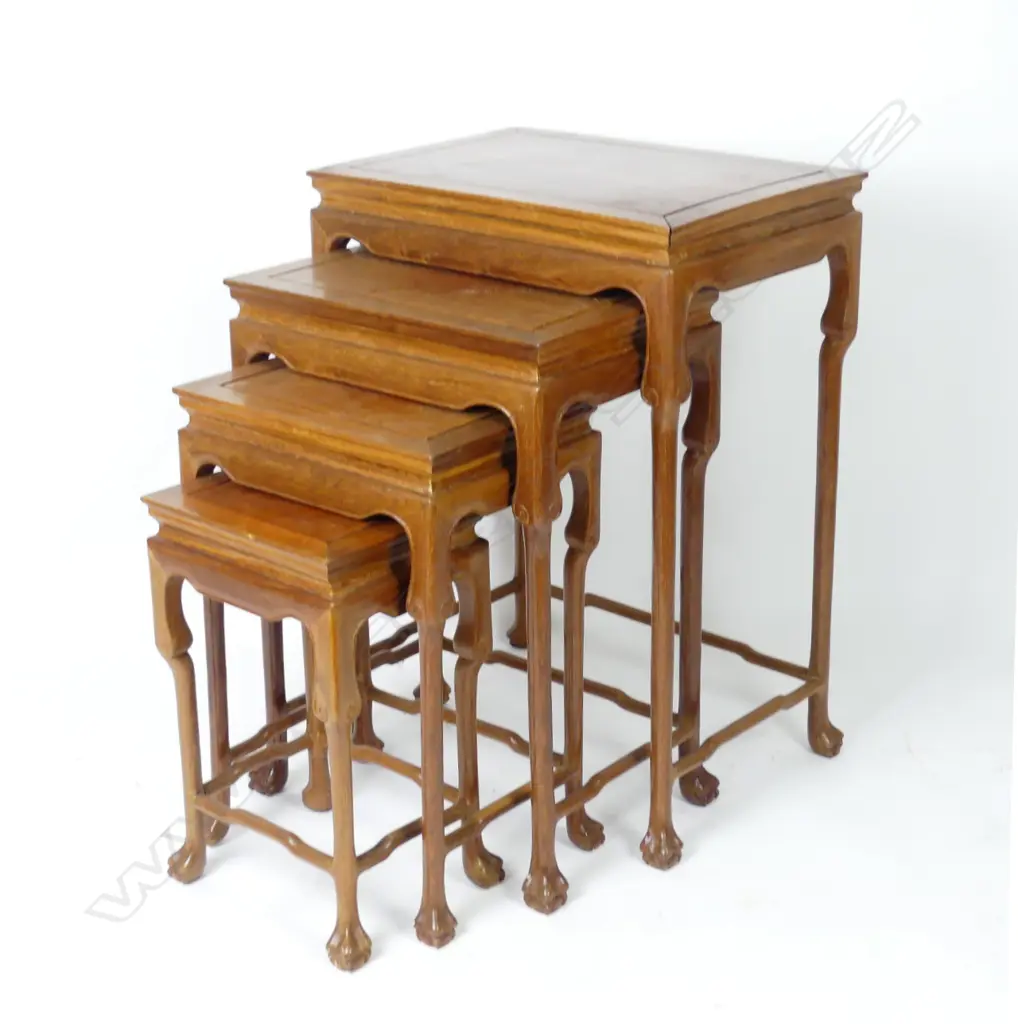 A nest of four Chinese light rosewood tables Image 1++