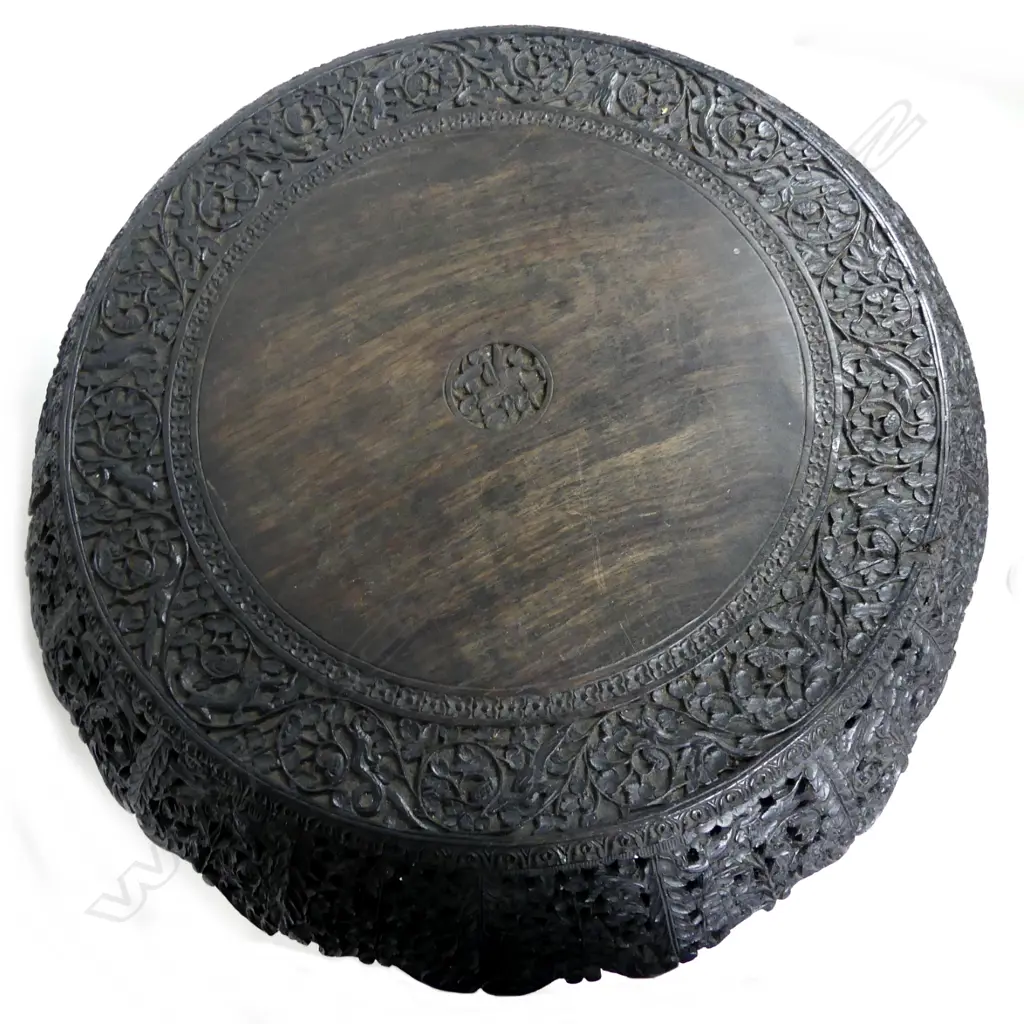 A carved Indian rosewood occasional table Image 1++