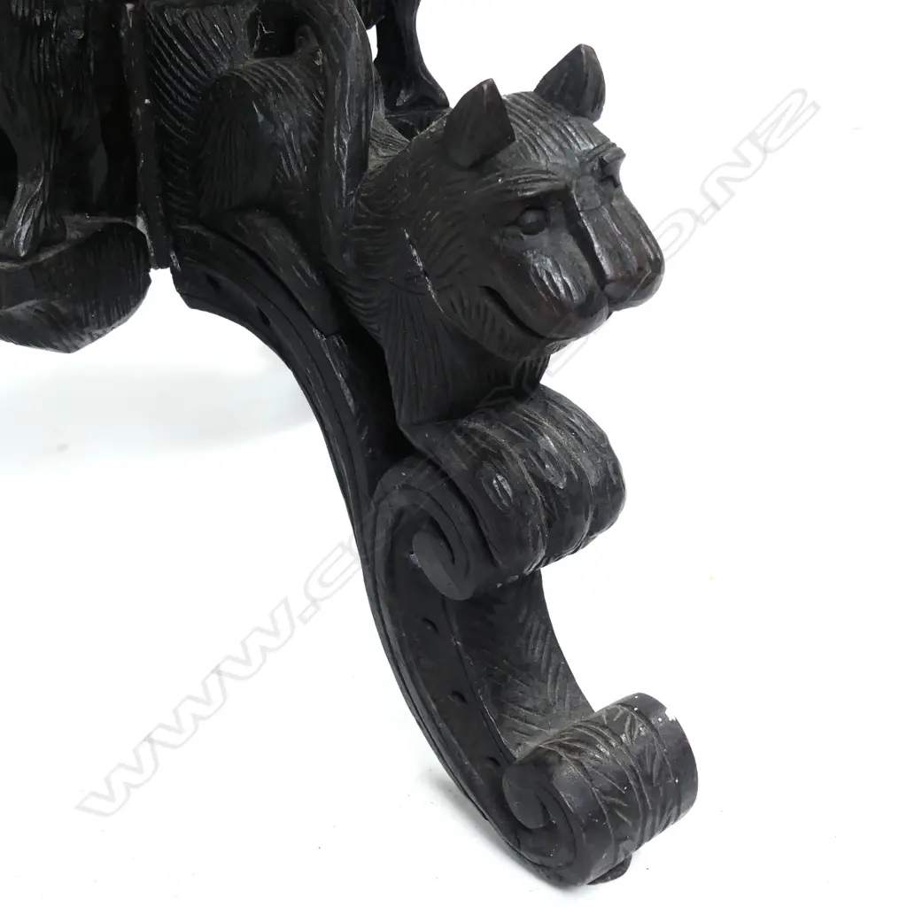 A carved Indian rosewood occasional table Image 1++