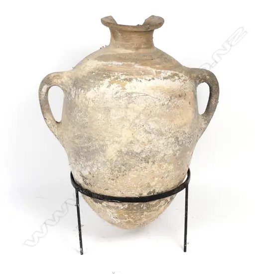 A large pottery amphora storage jar