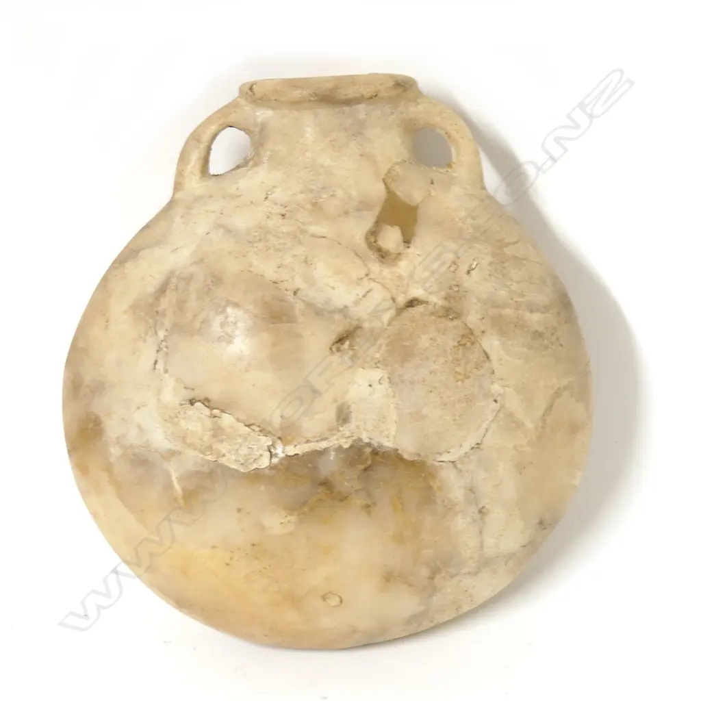 An Egyptian alabaster pilgrim flask Image 1++