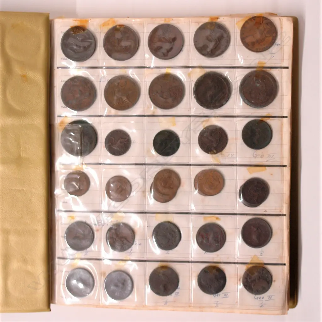A collection of older world coinage in album Image 1++