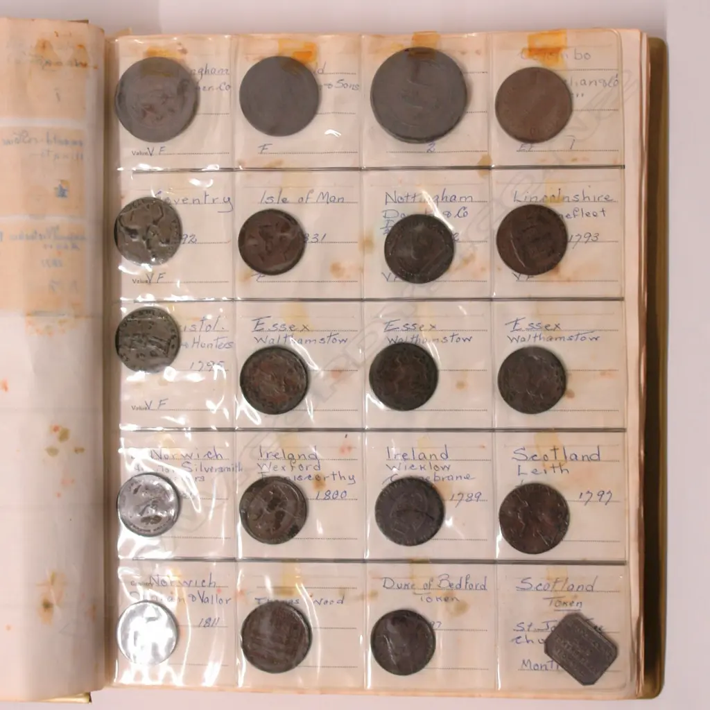 A collection of older world coinage in album Image 1++