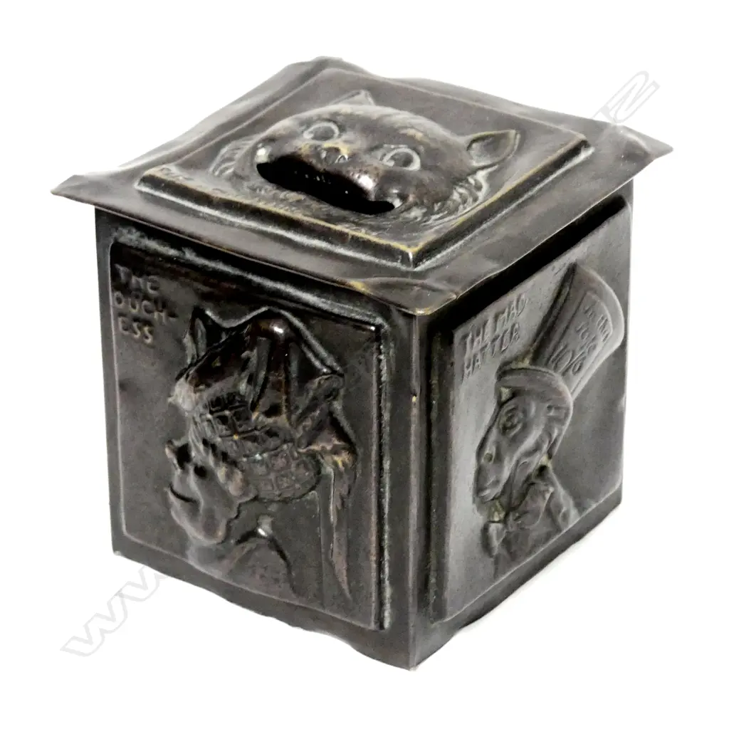 A 1909 English brass 'Alice in Wonderland' moneybox Image 1++
