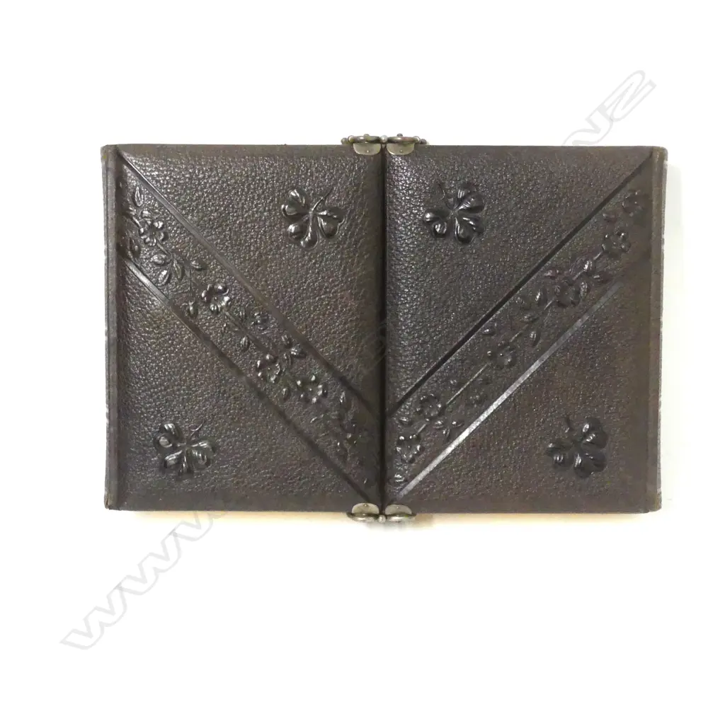 A Victorian leather bound double opening photograph album Image 1++