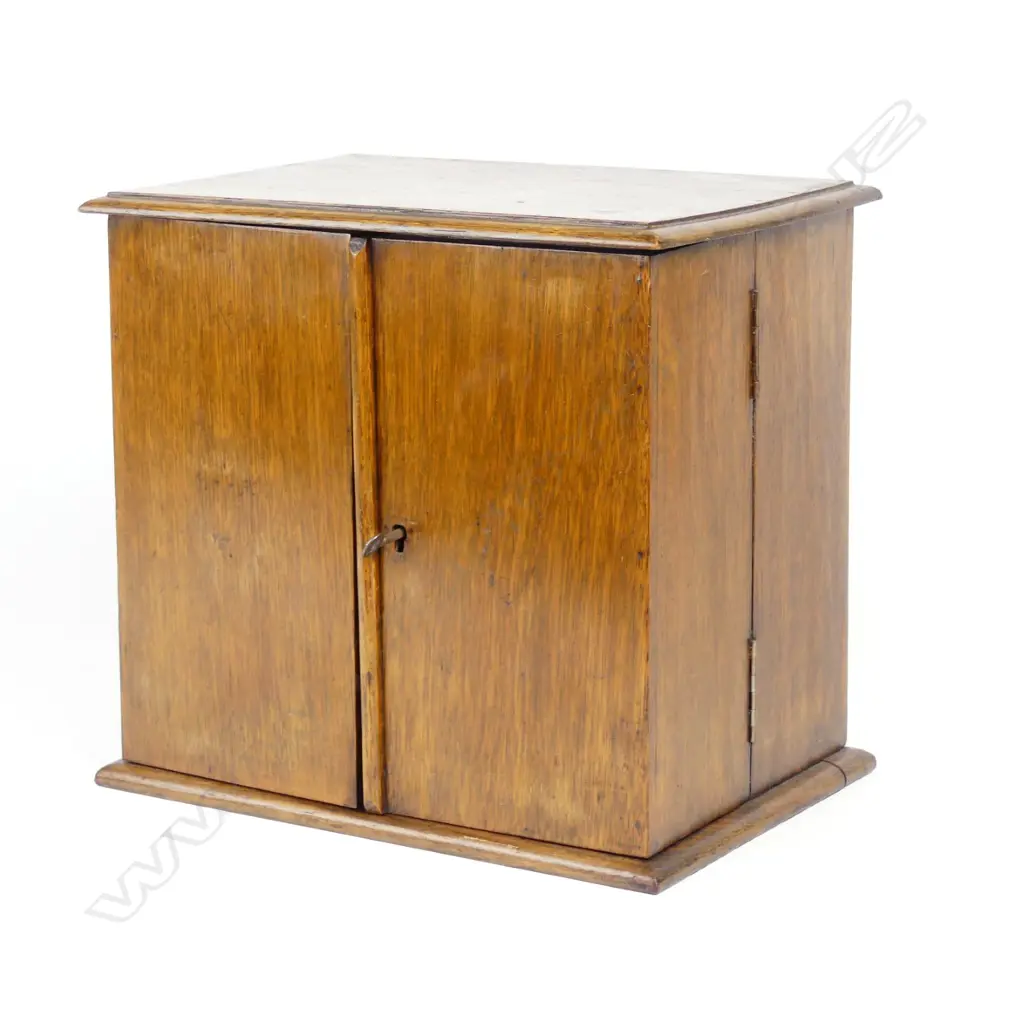 An Edwardian oak smoker's compendium Image 1++