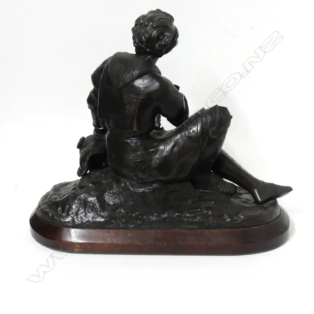 A bronze statuette of a battle weary knight Image 1++