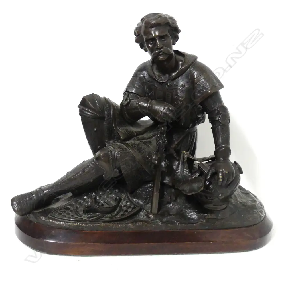 A bronze statuette of a battle weary knight Image 1++