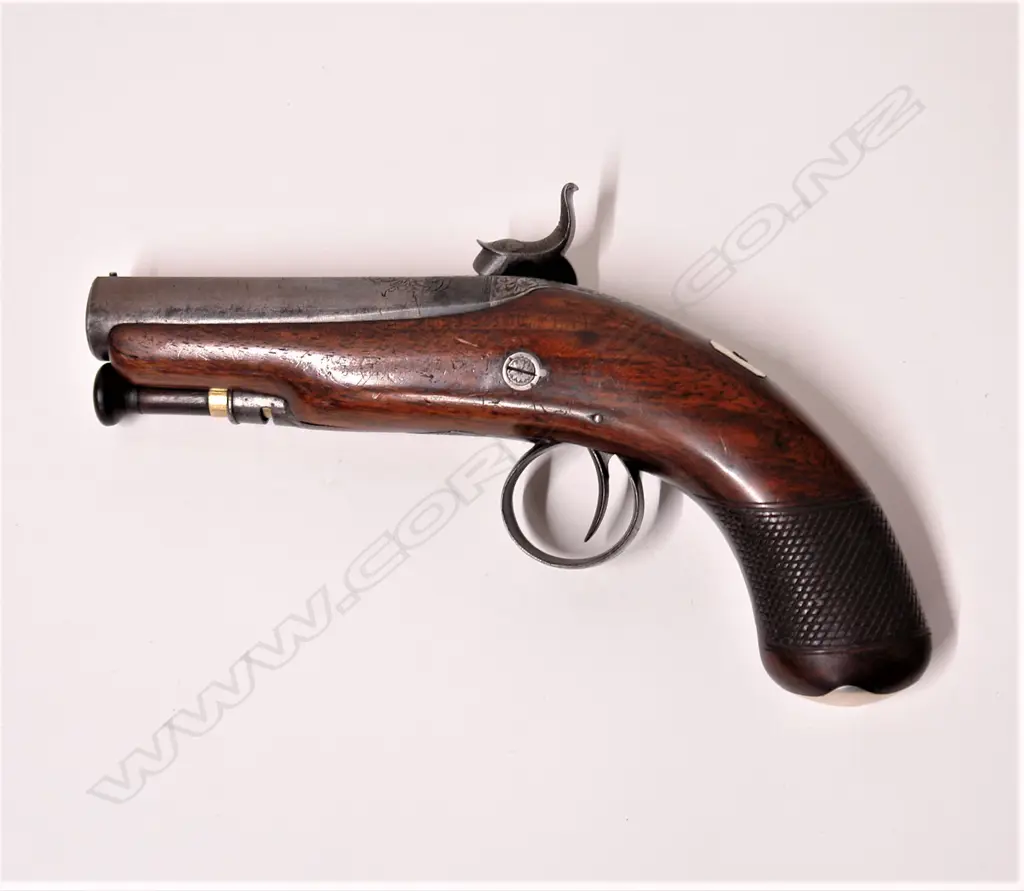 A c.1830s Irish round barrelled percussion pistol by Dowling of Dublin Image 1++