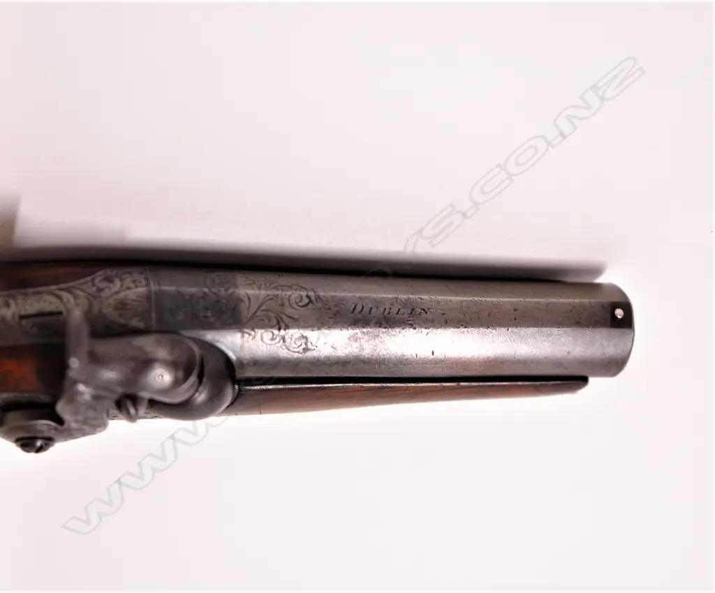 A c.1830s Irish round barrelled percussion pistol by Dowling of Dublin Image 1++
