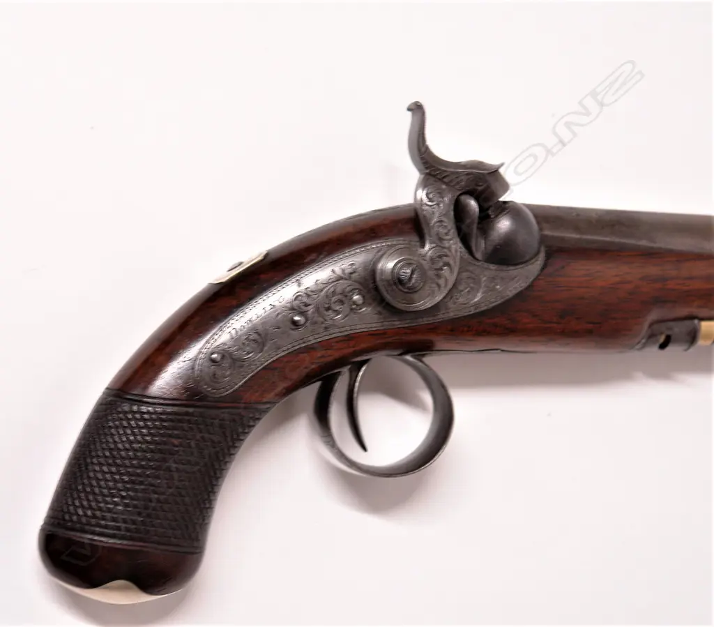 A c.1830s Irish round barrelled percussion pistol by Dowling of Dublin Image 1++