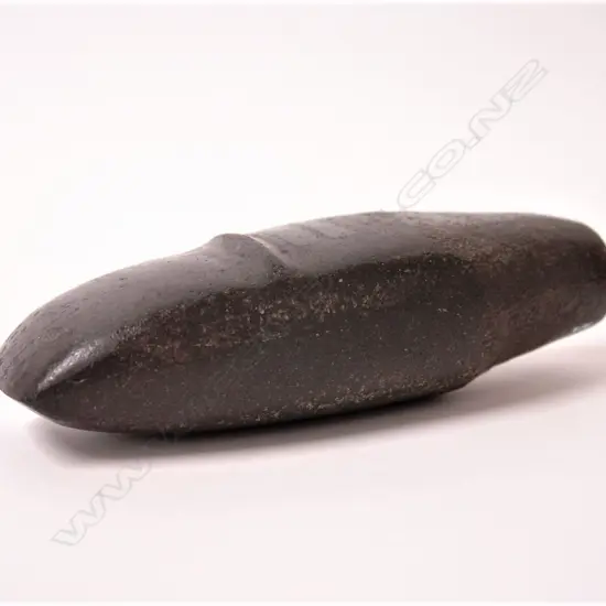 A pre-European black basalt toki (adze)