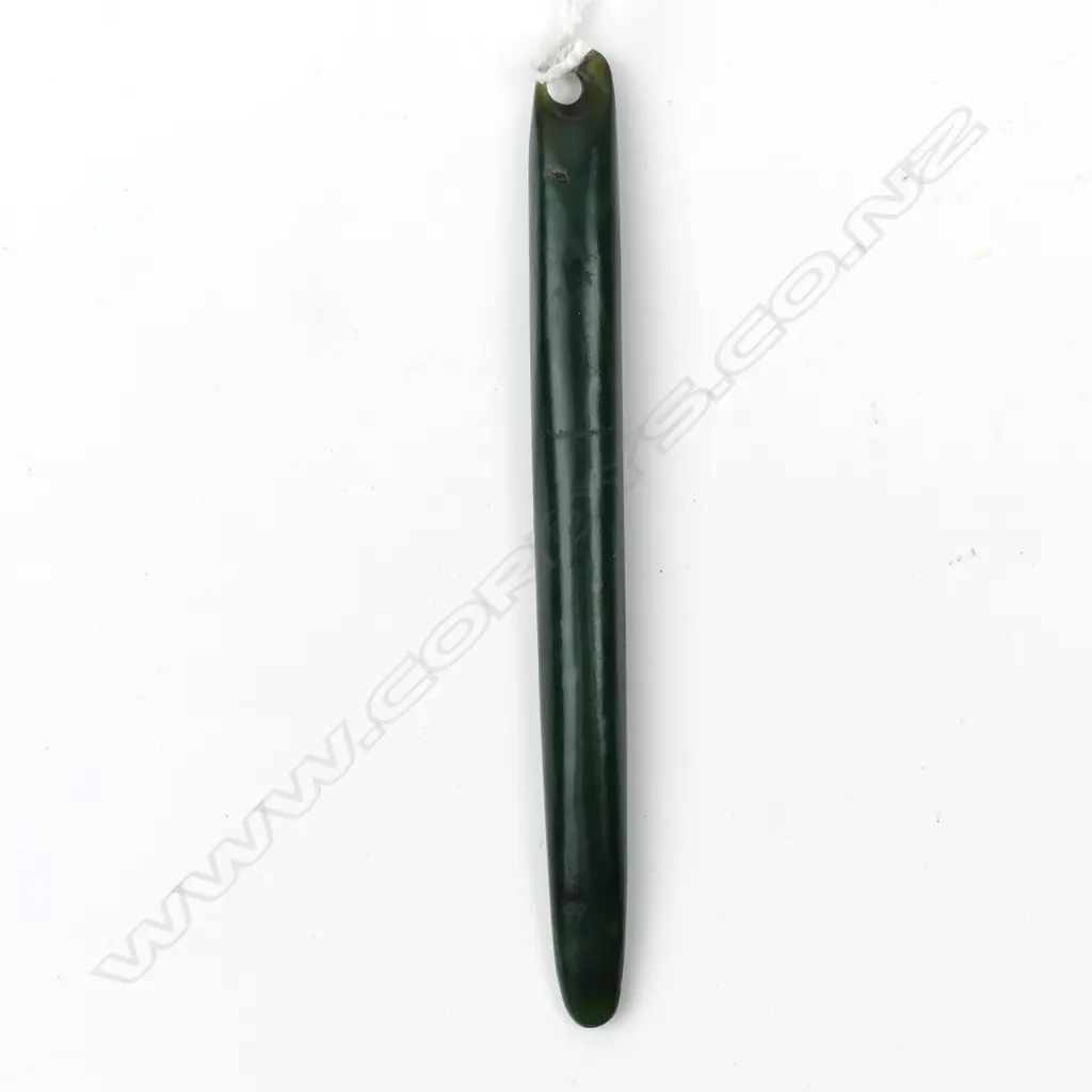 A pounamu kuru pendant Image 1++