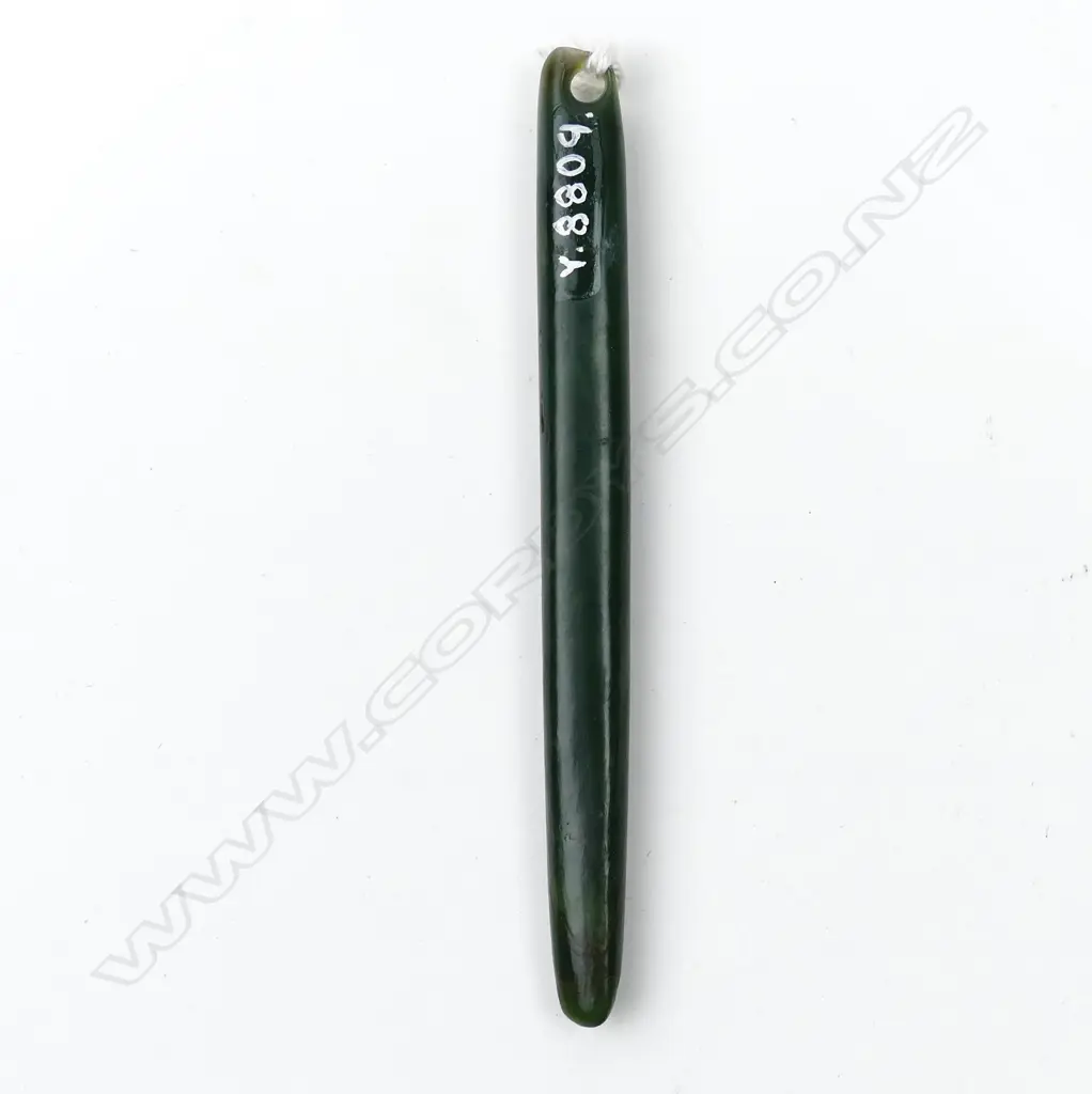 A pounamu kuru pendant Image 1++