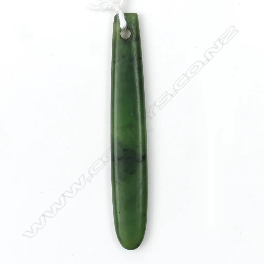 A pounamu kuru pendant Image 1++