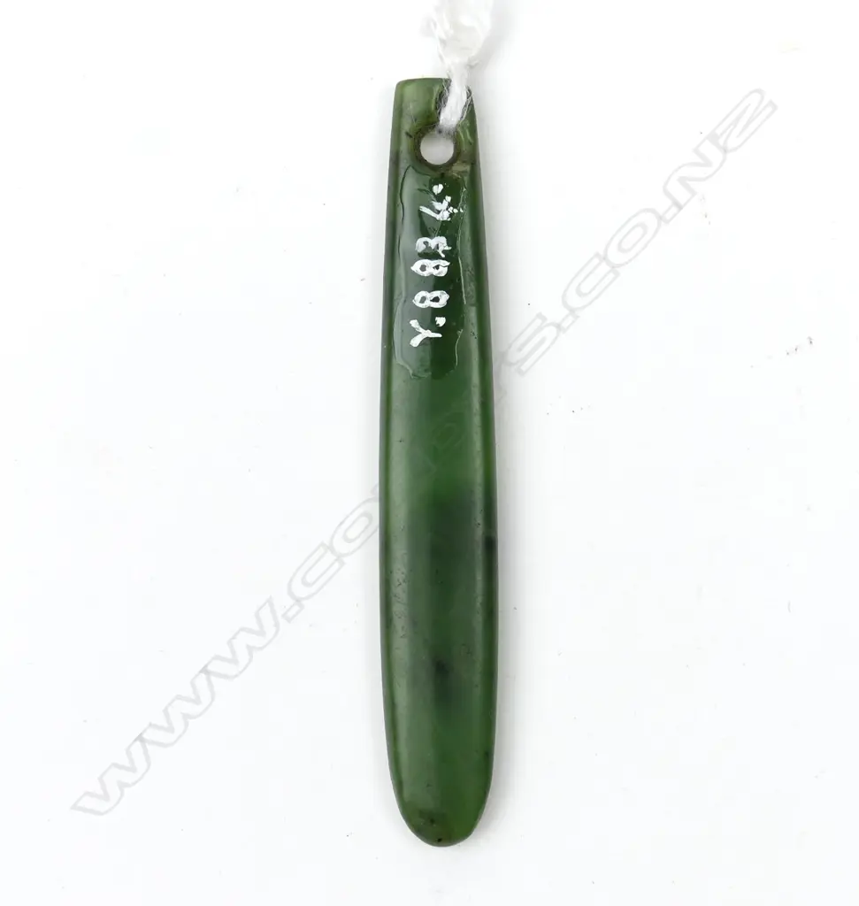 A pounamu kuru pendant Image 1++