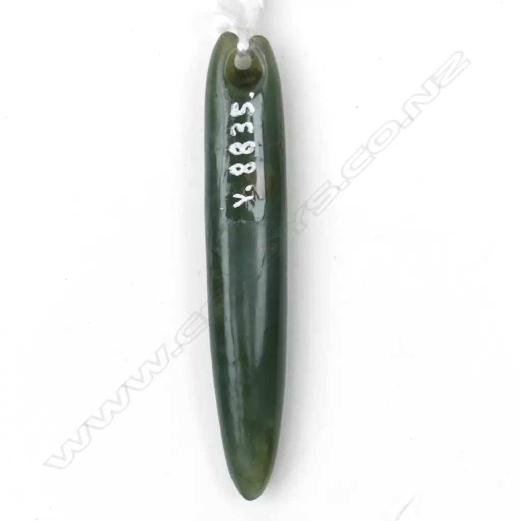 A pounamu kuru pendant Image 1++