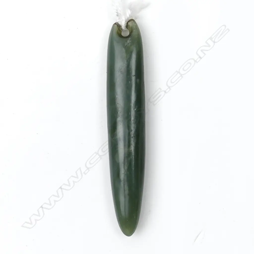 A pounamu kuru pendant Image 1++