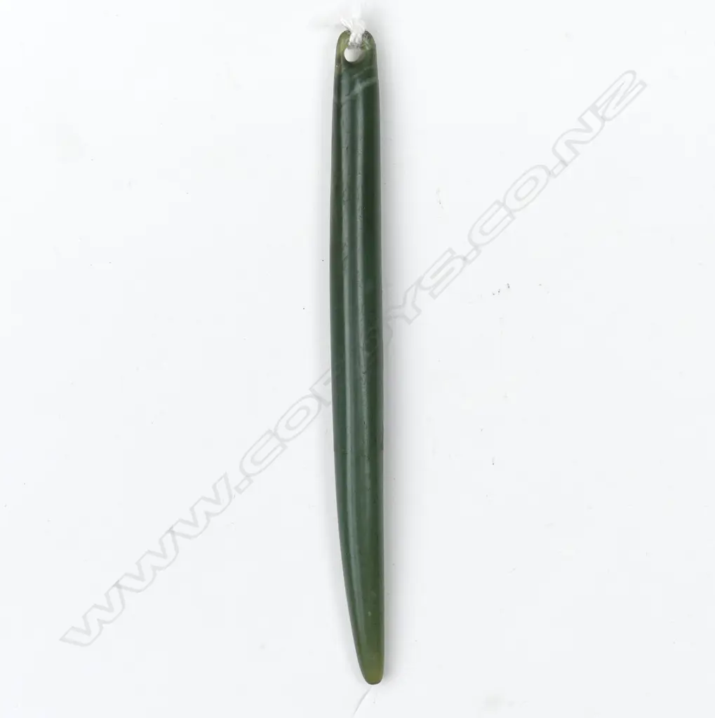 A pounamu kuru pendant Image 1++