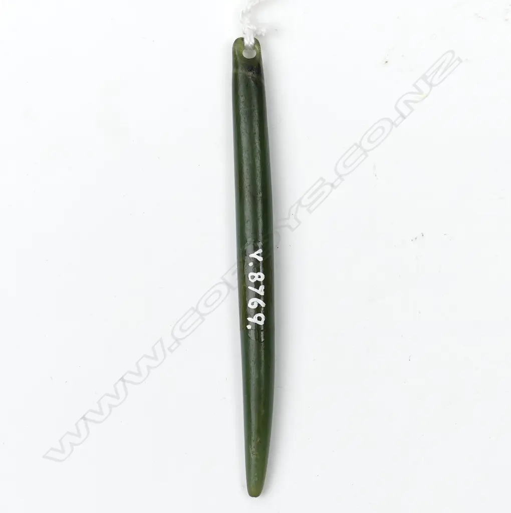 A pounamu kuru pendant Image 1++