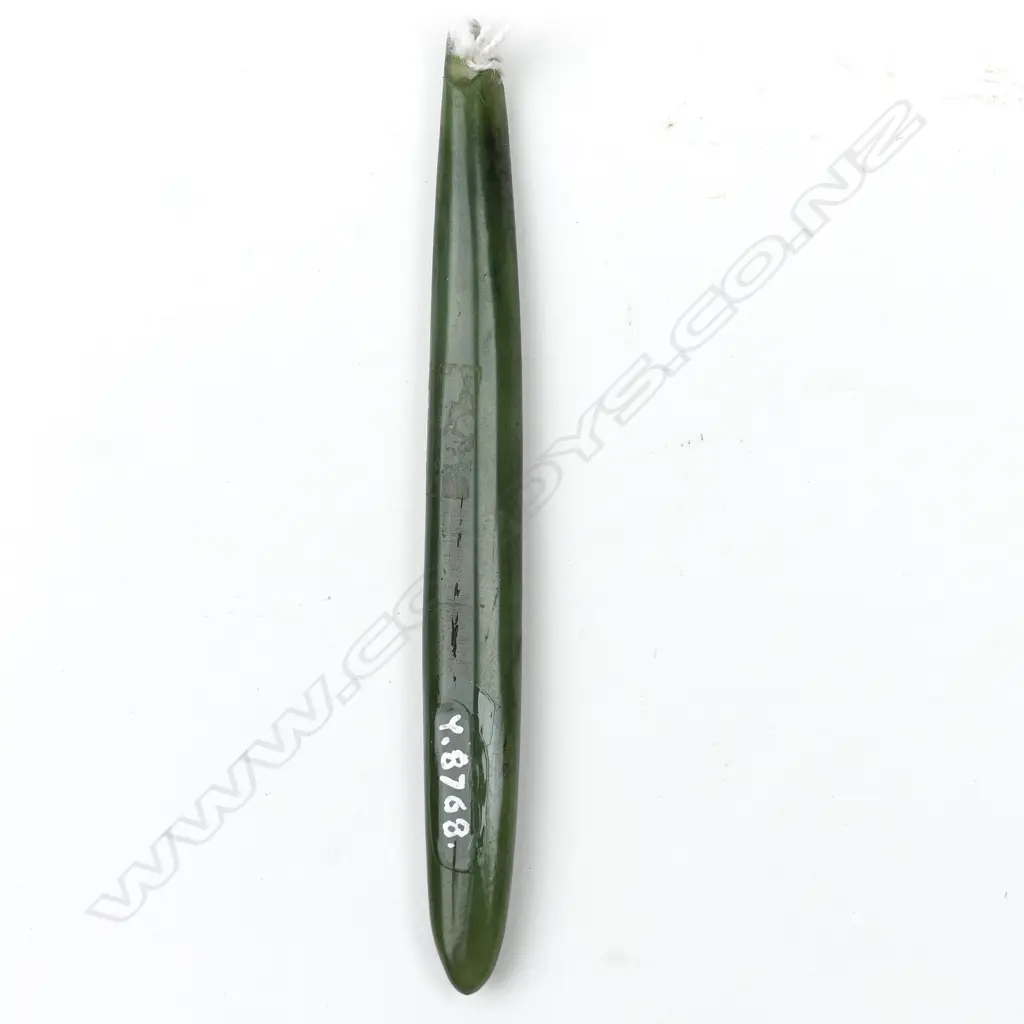 A pounamu kuru pendant Image 1++