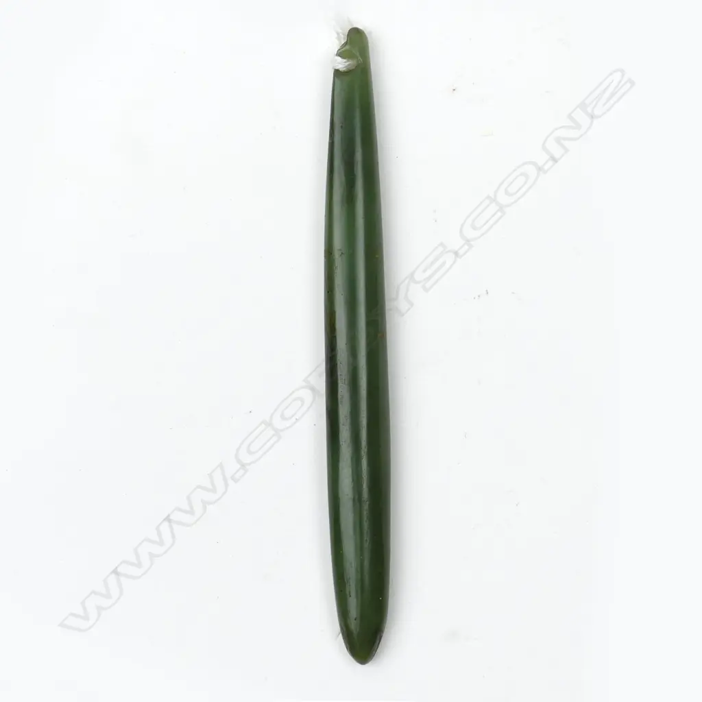 A pounamu kuru pendant Image 1++