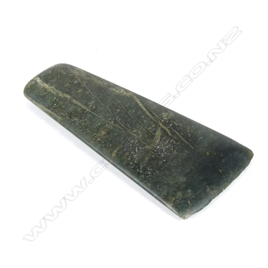 A wide flat nephrite adze blade Image 1++
