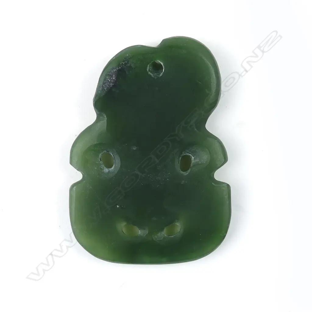 A 20thC carved pounamu hei tiki Image 1++