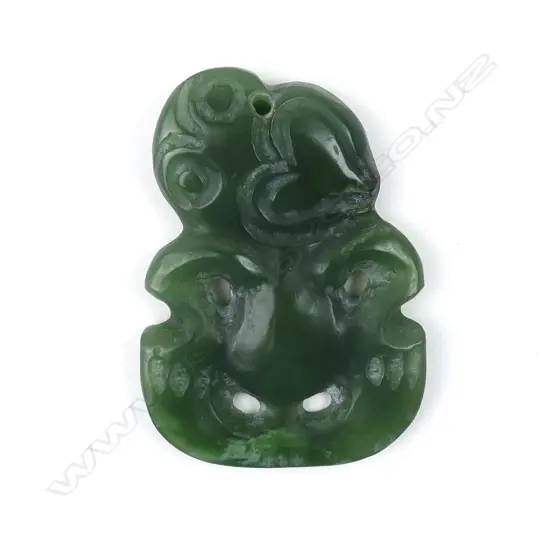 A 20thC carved pounamu hei tiki