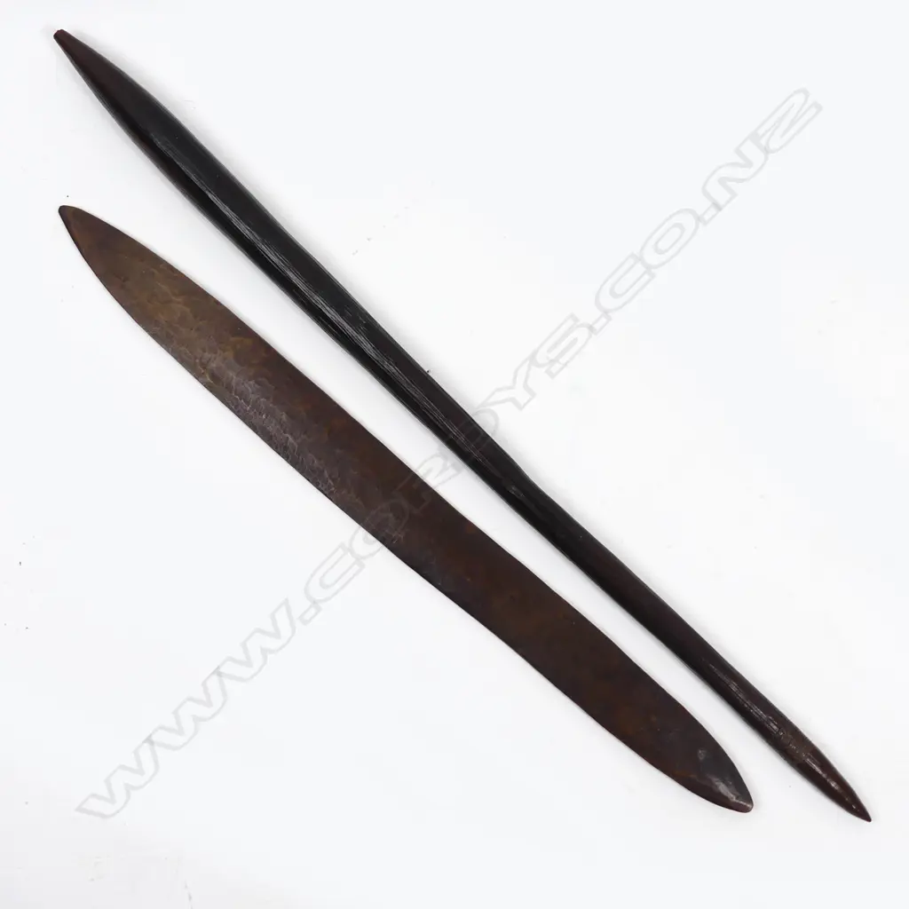 An Aboriginal nulla nulla and a tjuringa Image 1++
