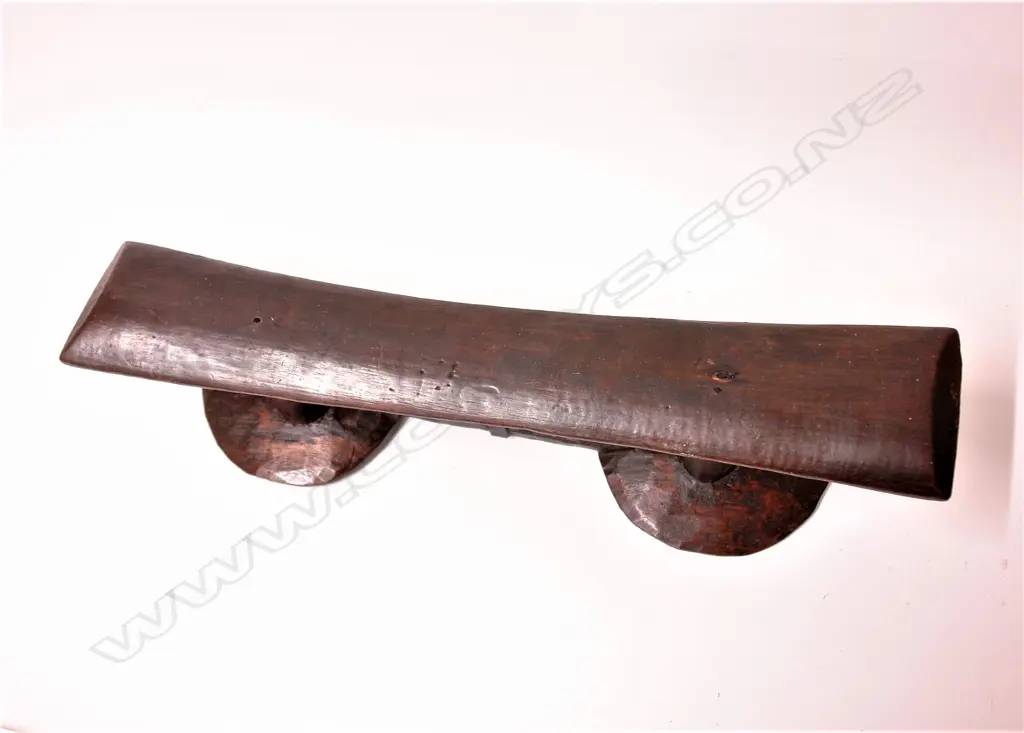 An old Fijian wooden headrest Image 1++