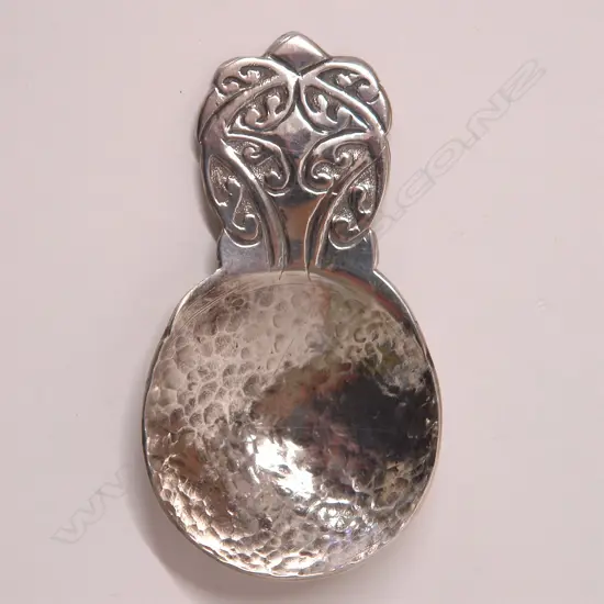 A rare Reuben Watts (NZ 1869-1940) Maori decorated silver caddy spoon