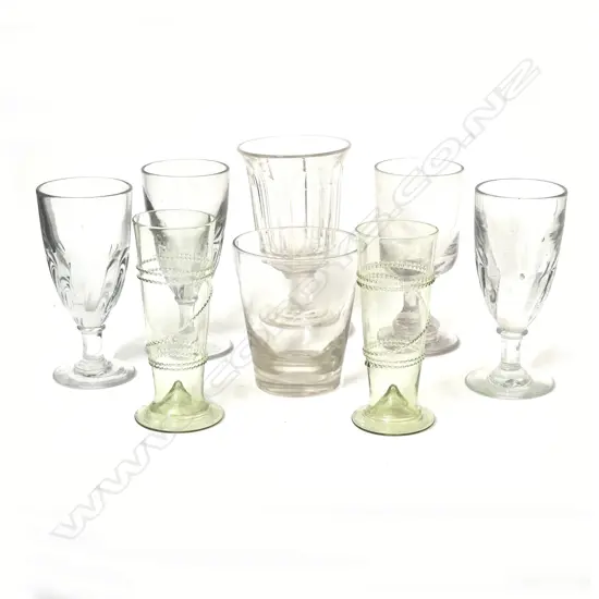 Eight various drinking glasses