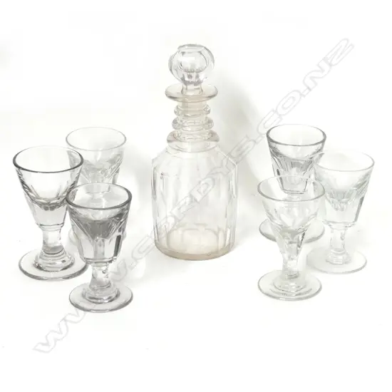 A Georgian decanter and six glasses