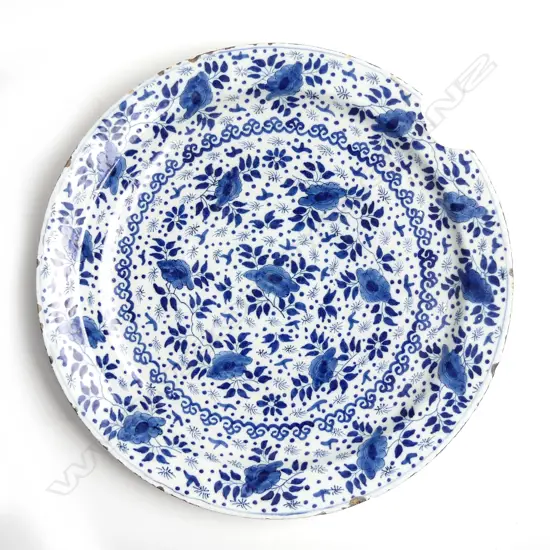 An 18thC English delft large blue and white dish