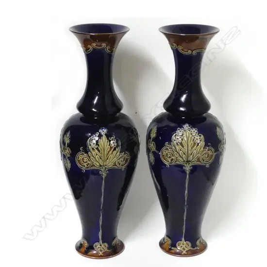 A pair of Doulton Art Nouveau tall vases