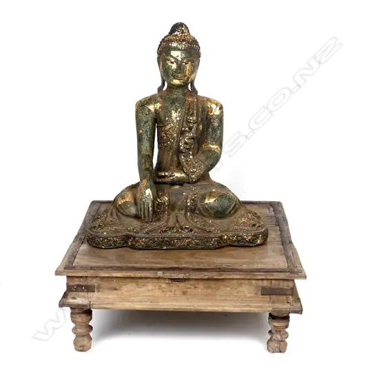 A vintage wooden Buddha