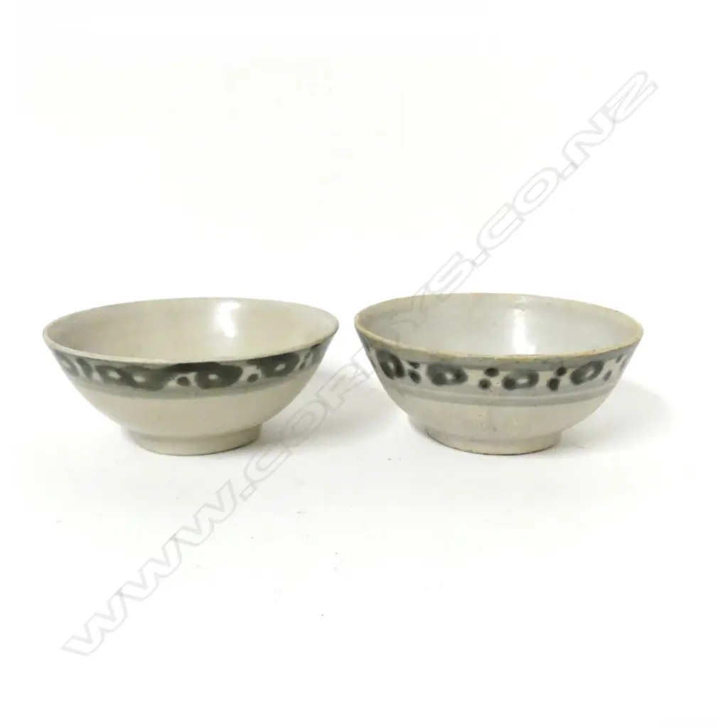 Two small bowls salvaged from the Tek Sing Image 1++