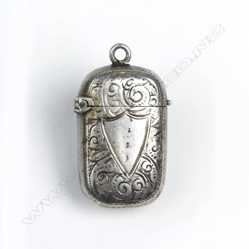 A Victorian silver engraved vesta case Image 1++