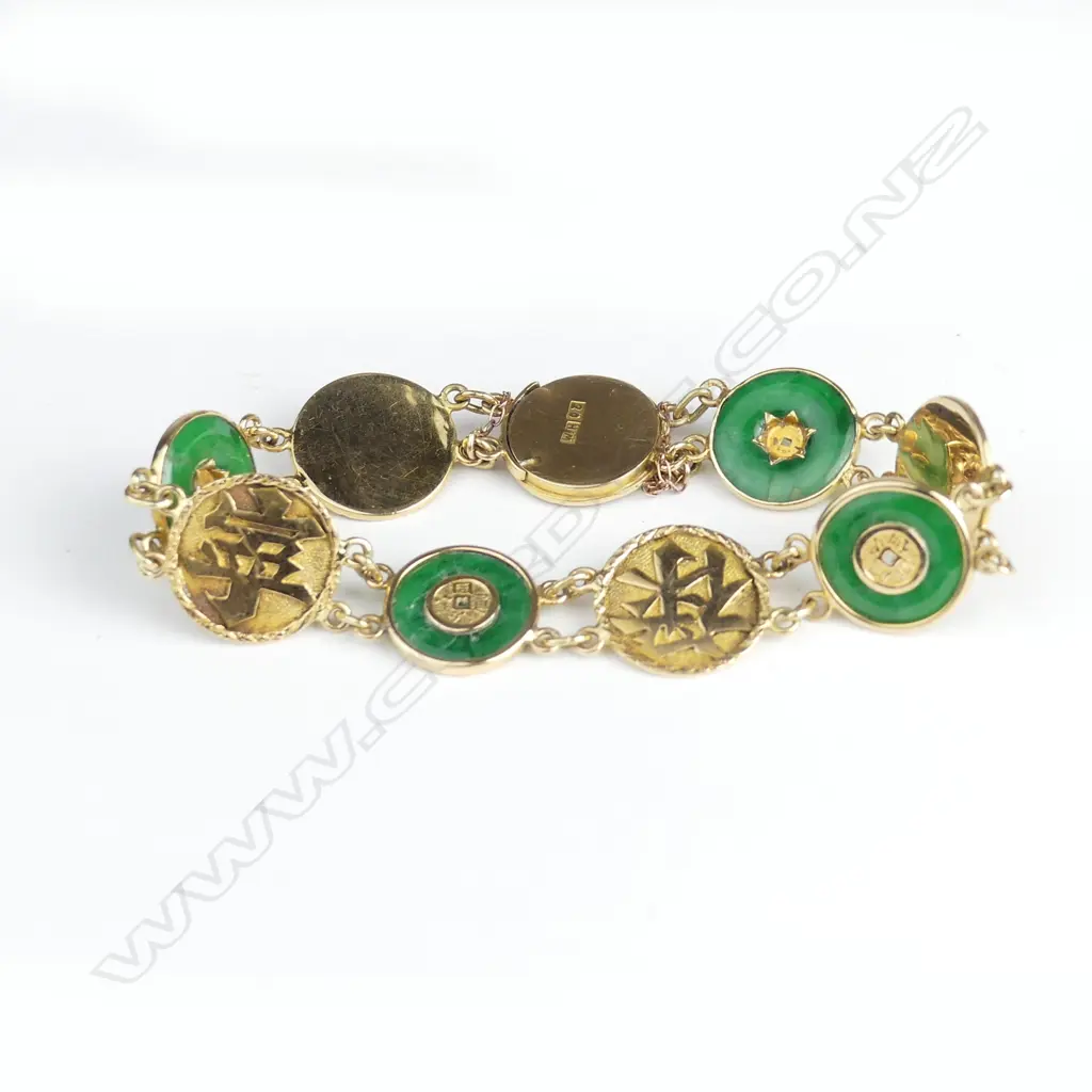 A Chinese 18ct gold and jadeite bracelet Image 1++