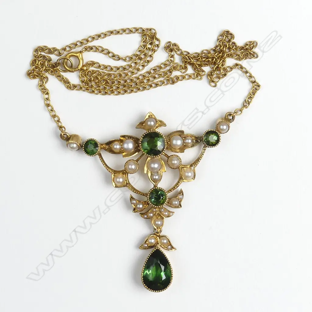 An Edwardian 15ct. yellow gold tourmaline and seed pearl pendant on chain Image 1++