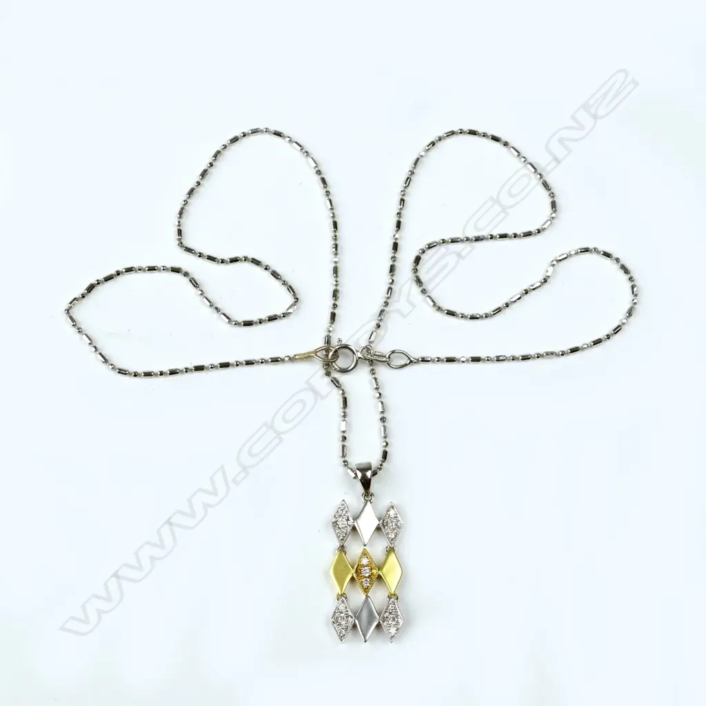 An 18ct. gold and diamond pendant Image 1++