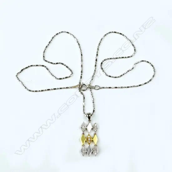 An 18ct. gold and diamond pendant