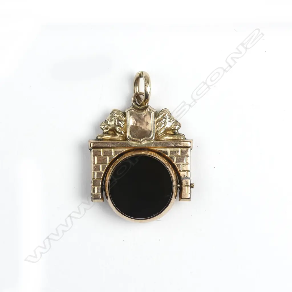 A 9ct rose gold and bloodstone fob spinner Image 1++