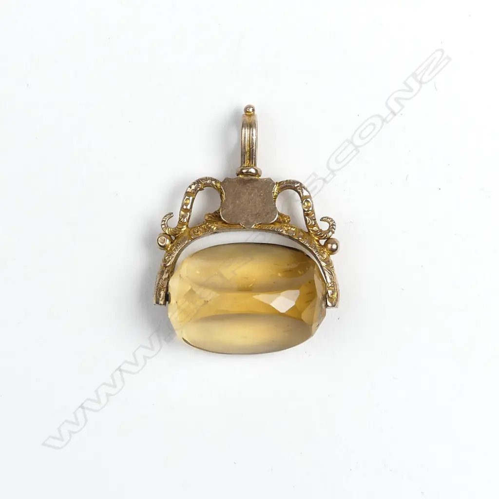 A 9ct rose gold and citrine spinner Image 1++