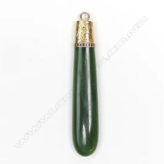 A quality late 19thC N.Z. colonial greenstone and 15ct. yellow gold mounted pendant