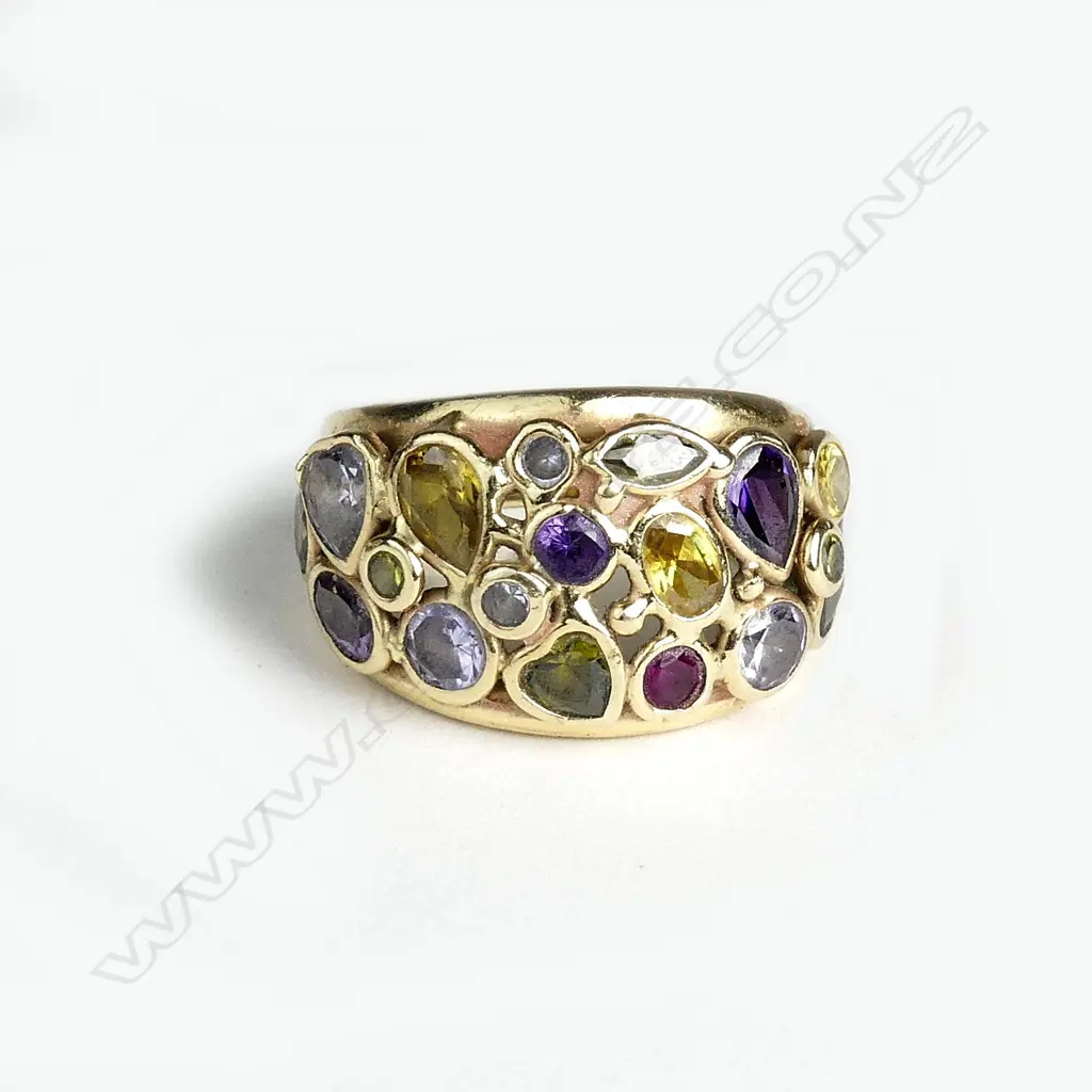 A contemporary 14ct gold and semi-precious stone dress ring Image 1++